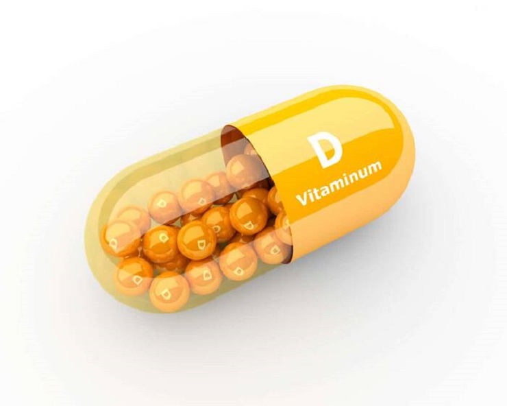 3d vitamin D capsule lying on desk